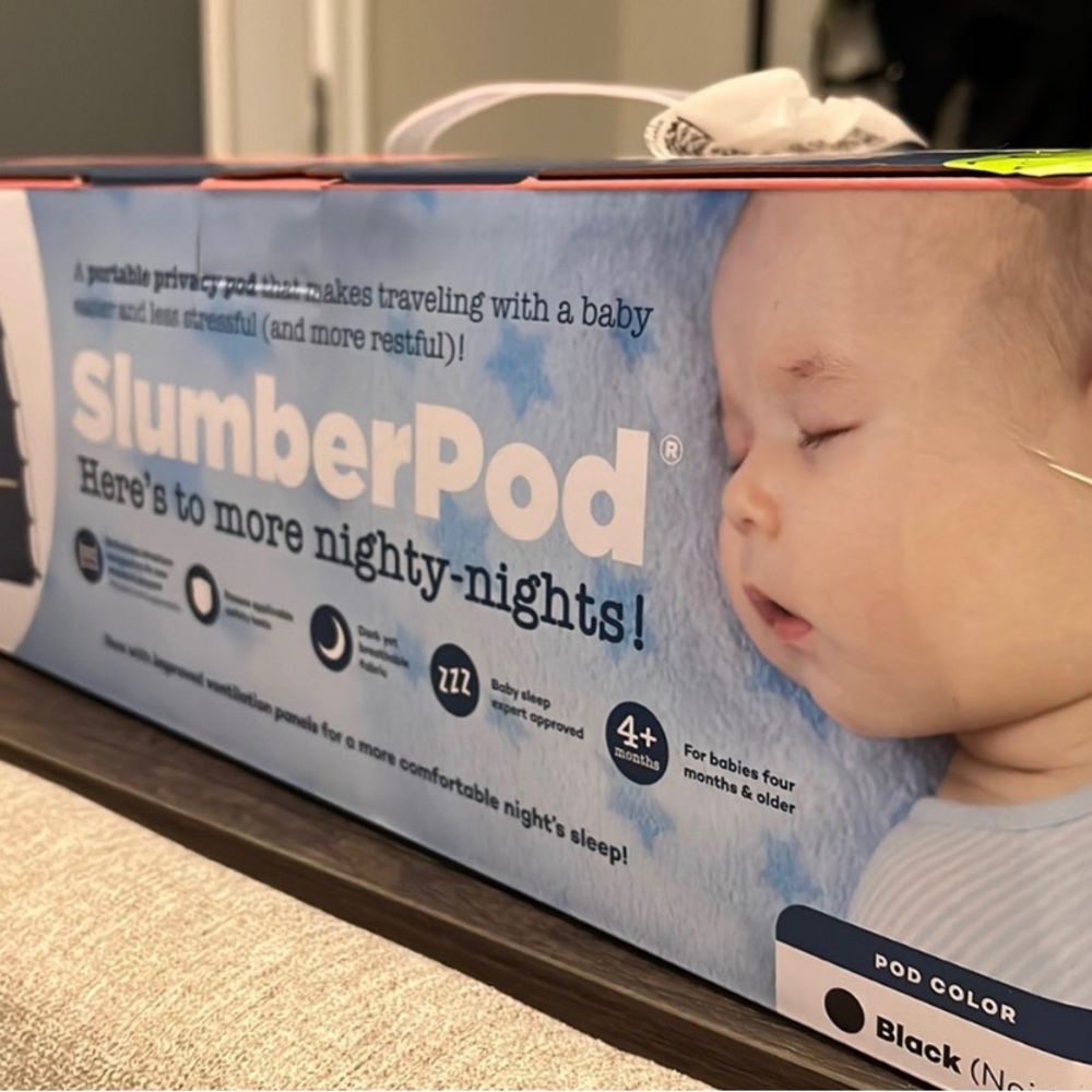 Slumber Pod. Black. Portable privacy pod for traveling with baby.